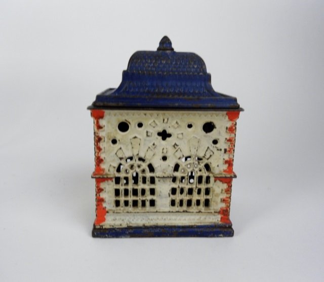 CAST IRON BANK: Original paint. Small hairline crack to base.Ht. 14 cm. (5.5 in.)