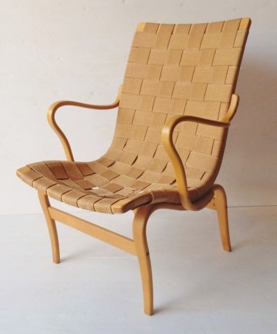 BRUNO MATHSSON EVA LOUNGE CHAIR: Signed with applied manufacturer's mark to underside: [Bruno Mathsson Firma Karl Mathsson Made In Varnamo Sweden] and dated: (1960). Condition noted to fabric.