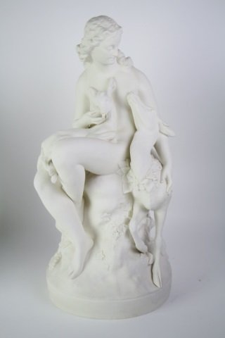LARGE 19TH CENTURY PARIAN WARE STATUE: Depicting a woman with deer. Signed on base G. B. Birch SC. 1864. Note small chip under base. Ht. 48 cm. (19")
