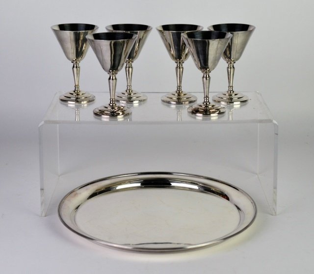 MODERN SILVER PLATE MAPPIN & WEBB COCKTAIL SET: MODERN SILVER PLATE MAPPIN & WEBB COCKTAIL SET A set of six stems designed by Keith Murray #28084 t/w circular tray #27837. D of tray: 12 in.