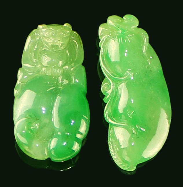 TWO CHINESE CARVED NATURAL JADEITE PENDANT: Guarantee Grade A jadeite or refund&#