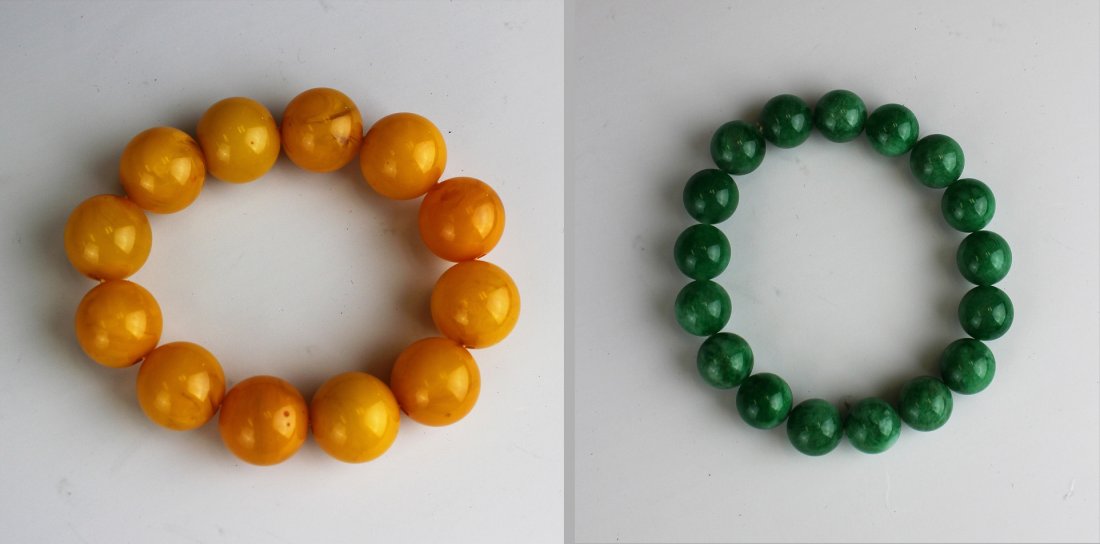2 BRACELETS (JADEITE BEADS AND AMBER BEADS): "Two Bracelets (Jadeite Beads And Am&