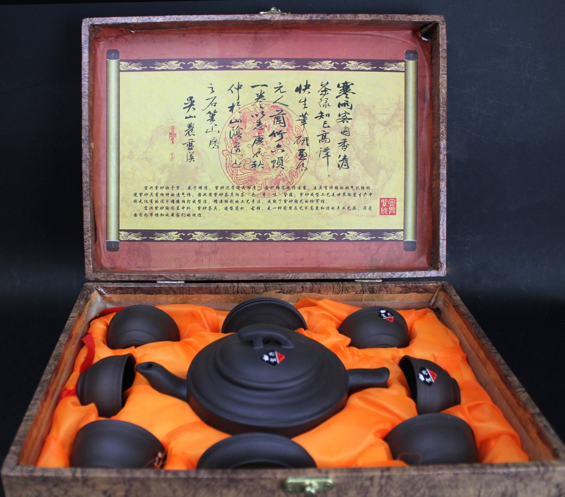 CHINESE YIXING TEA SET: 宜興茶具一套 Teapot: L 19 CM (7 1/2 IN) Cup: Dia 6.3 CM (2 1/2 IN) Coaster: Dia 7.5 CM (3 IN)