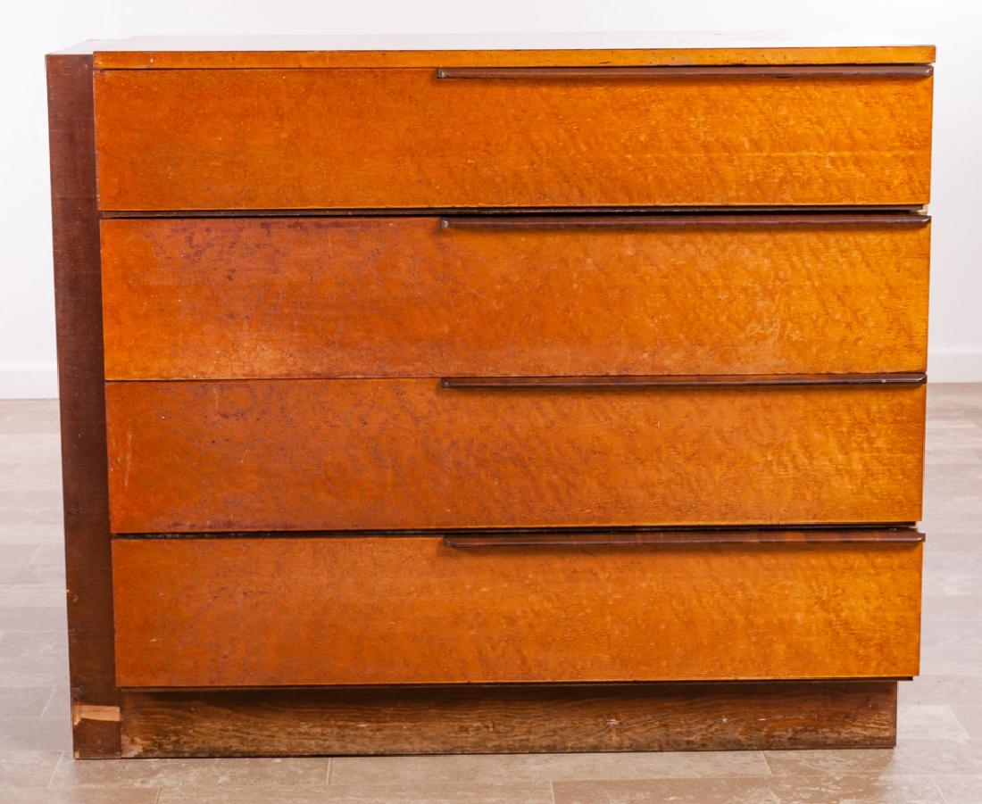 Gilbert Rohde Art Deco Four Drawer Dresser: Circa 1940 Art Deco four drawer dresser designed by Gilbert Rohde for Herman Miller with an Ash burl and black walnut design and having a custom glass top; measures approximately 36" high, 43" wide an