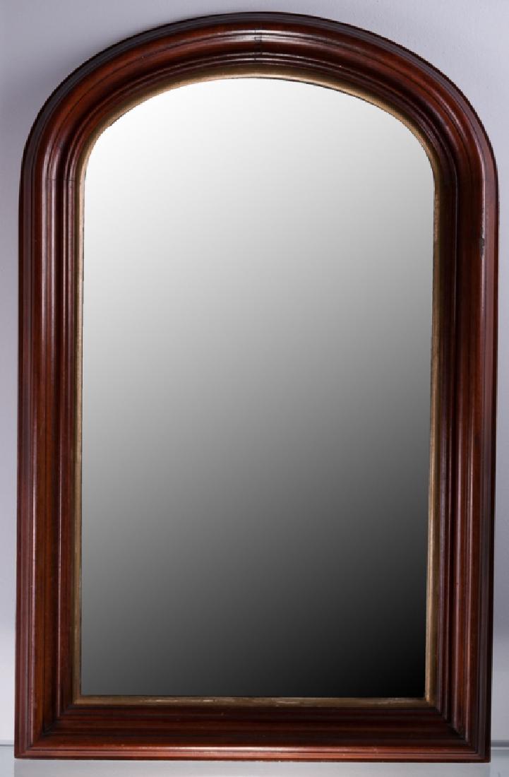 Mahogany Framed Arched Top Mirror: Early to Mid-19th Century mahogany framed mirror with an arched top; measures approximately 33-1/2” high and 21-3/8” wide.