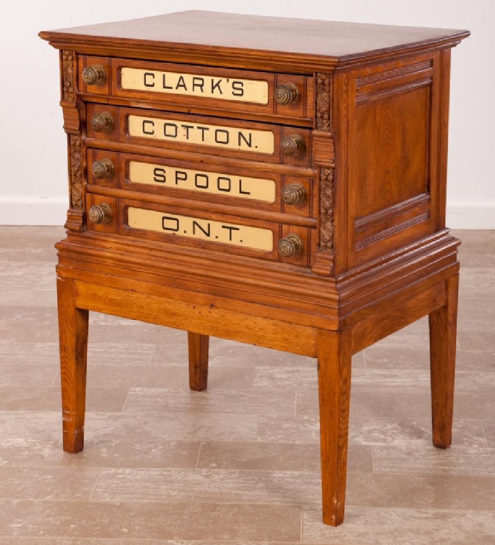 Clark’s Spool Thread Cabinet: Clark’s four drawer spool cabinet of mixed woods having black lettering with gilt front panels marked “Clark’s,” “Cotton,” “Spool” and “ONT” (Our Newest Threads), and with floral a