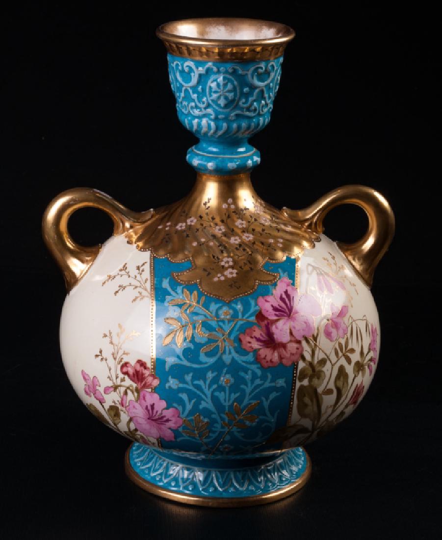 Royal Bonn Porcelain Two-Handled Vase: Royal Bonn established in 1836 as the trade name used by Franz Anton Mehlem, Early 20th Century porcelain two-handled vase, handpainted gilt with turqouise, rose, pink, gold, olive and raised relief d