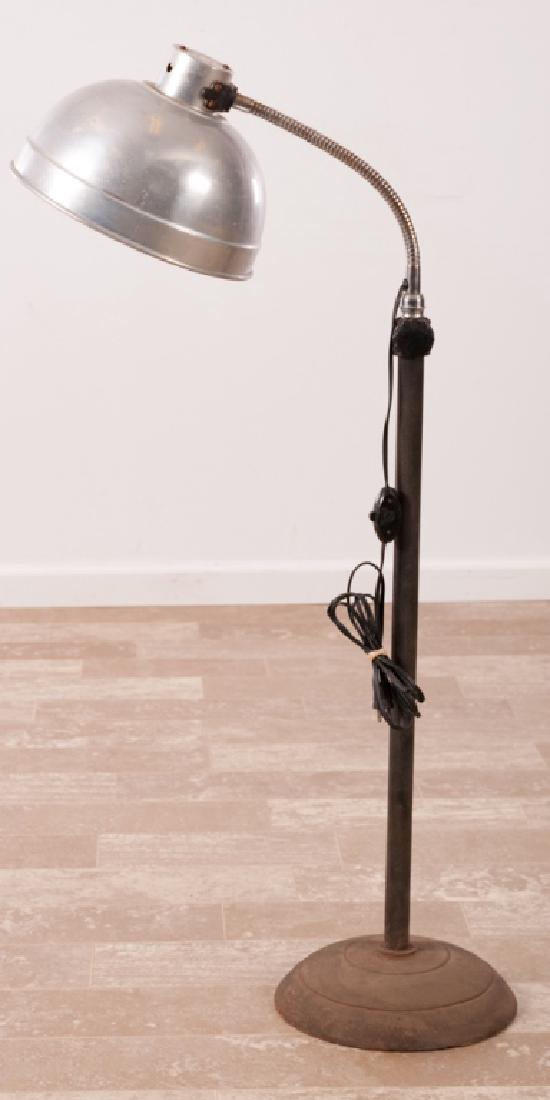 M. Brandt & Sons Industrial Floor Lamp: M. Brandt & Sons adjustable height industrial floor lamp with a cast iron base, swivel gooseneck and aluminum shade; measures approximately 52-1/2” to 71” (adjustable) in height and 11” in diame