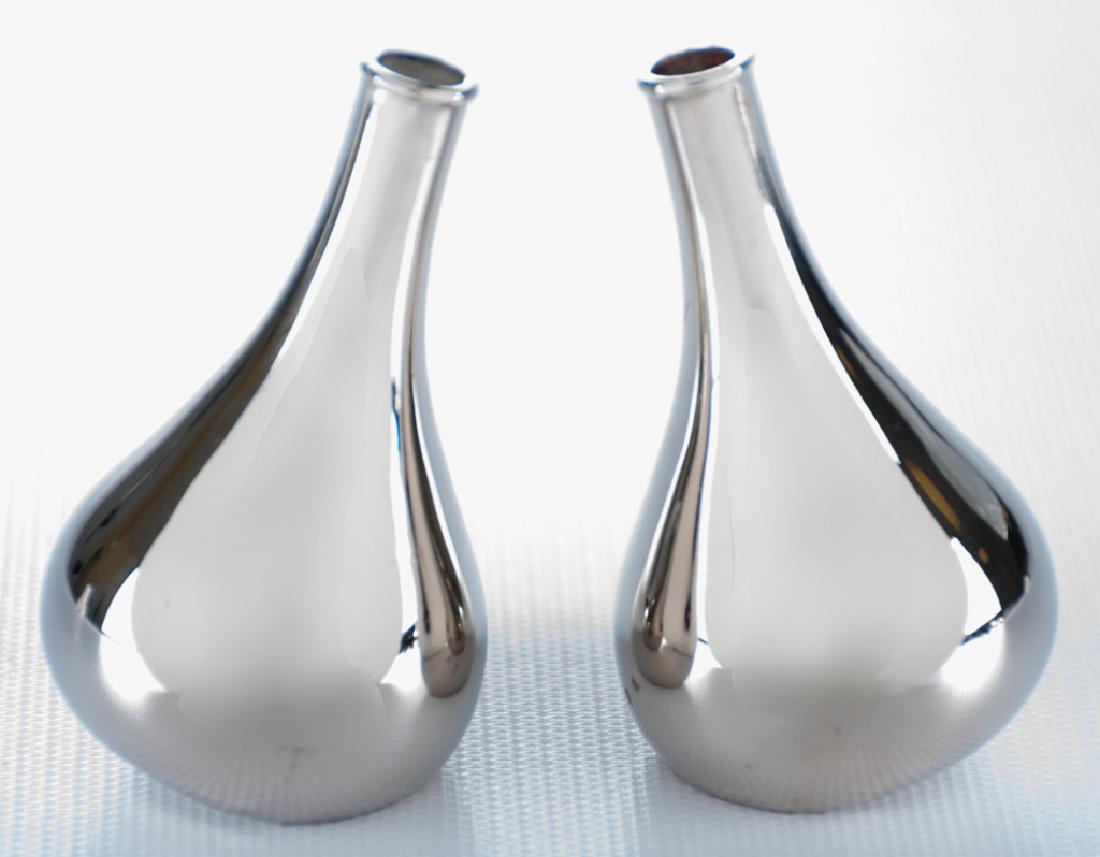 Jens Quistgaard "Onion" Mini Candleholders Pair: Pair of circa 1960s Jens Quistgaard for Dansk silver plate "onion" miniature taper candle holders, in original box; measures approximately 2-3/8” high and 1-3/8” in diameter. Marked to bottom. In