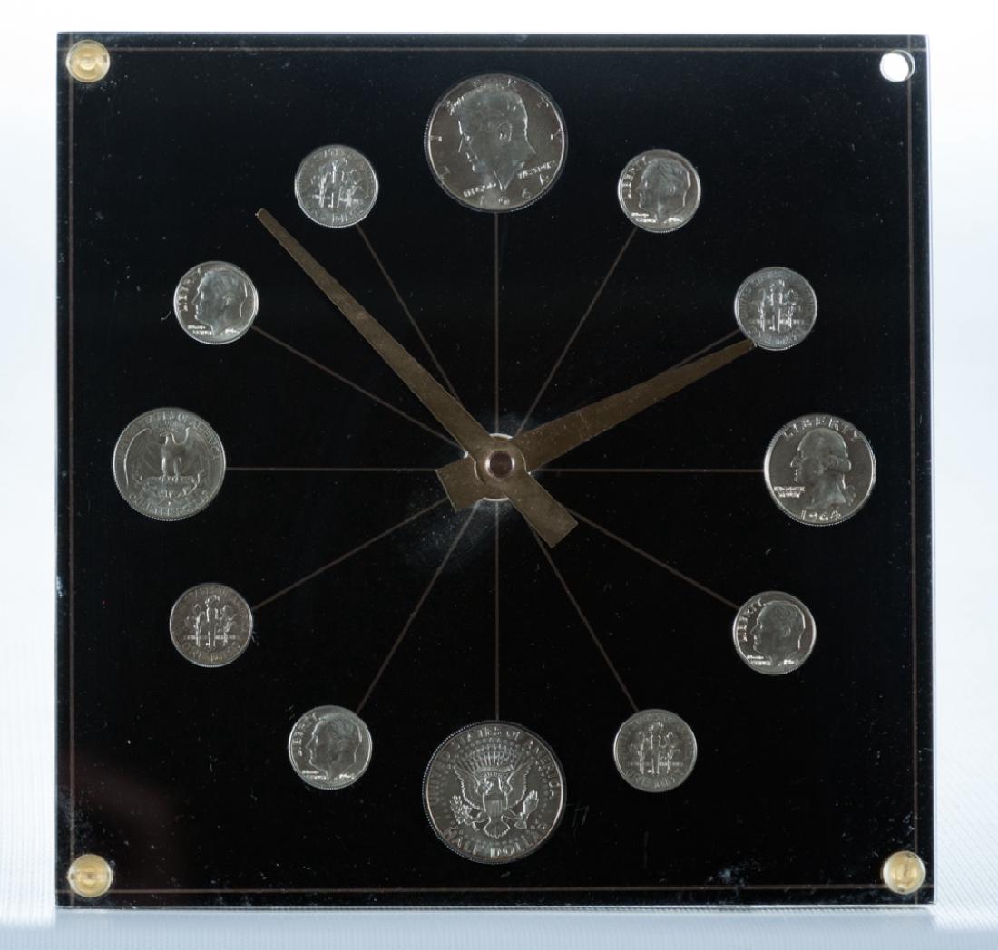 Hammacher Schlemmer 1964 Silver Coins Clock: Hammacher Schlemmer 1964 Last United States Silver Coinage clock model no. 72 black; measures approximately 7-5/8” square. Has not been tested.