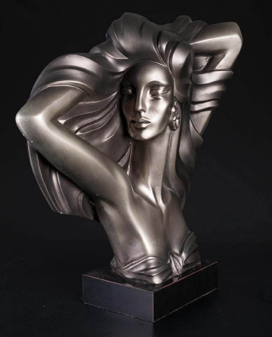 Alexsander Danel 1989 Contemporary Sculpture: Alexsander Danel (Russia/Estonia, 1940 - 2001) contemporary bust sculpture of a woman in a model's pose, measuring 20" in height with width of 19-1/2", and depth of 6". Marked to lower left "Austin Pr