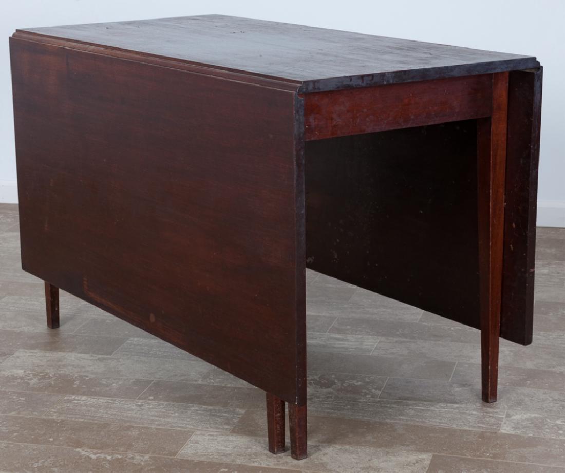 Sheraton Mahogany Deep Drop Leaf Table: Sheraton mahogany deep drop leaf dining table with double gate leg supports. Measures 30-1/4" high, 48" wide, and 23" long; each leaf measures 23-1/2". All measurements are approximate. Condition cons