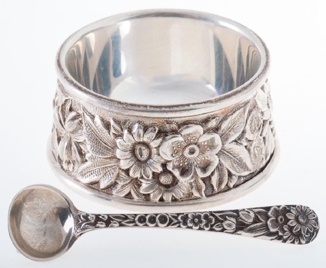 Sterling Repousse S. Kirk & Sons Salt Cellar: Circa 1828, with spoon with length of 2-1/2", each piece marked "S. Kirk & Sons Sterling" plus a "59A mark" to the base of the salt cellar itself. Salt cellar has a base diameter of 1-7/8" with top di