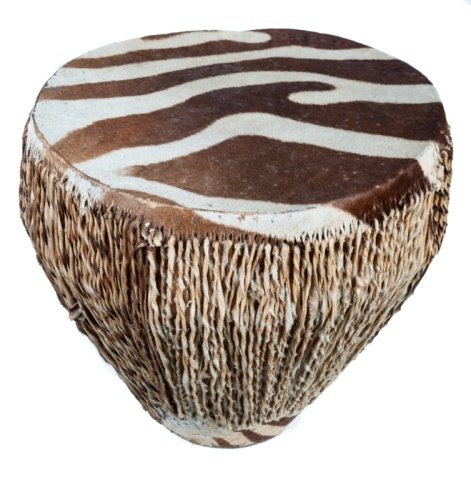 Zebra Hide African Drum: Zebra hide drum purchased in Kenya in 1970. Measures approximately 14-1/2" in height by 15-1/2" in diameter. In overall good condition, consistent with age and use.