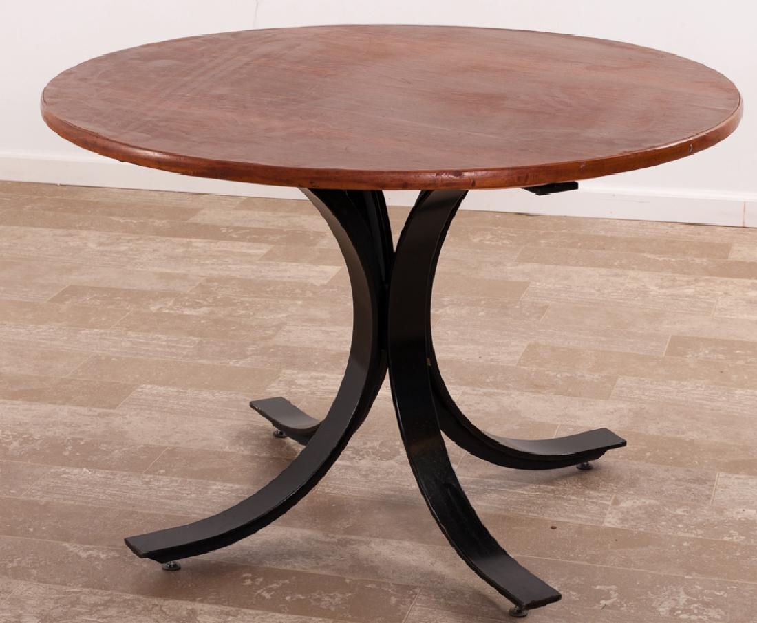 Osvaldo Borsani Circular Wood Top Table: Osvaldo Borsani table features a circular wood top resting on a sculptural steel pedestal base having four (4) curved legs, unmarked. Versatile table works well as a compact dining table, kitchen tabl
