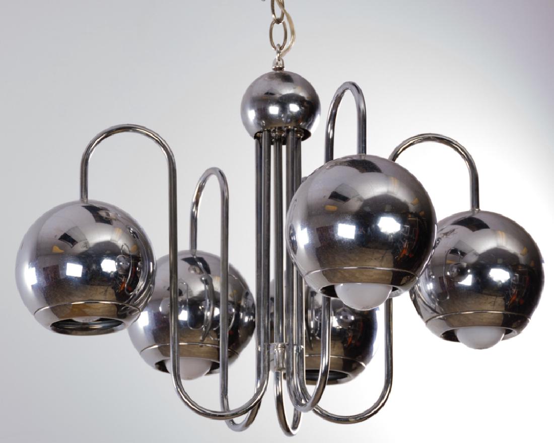 George Kovacs Style Lightolier Chrome Chandelier: Lightolier chrome finish chandelier having five-arms ending in round globes; measures approximately 17" high and 24" in diameter. "Lightolier" and "Union Made" labels to inside escutcheon plate. Has n