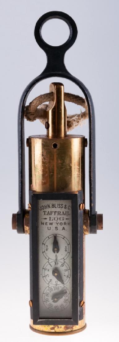 John Bliss Co. Taffrail Log: Brass John Bliss & Co. Taffrail Log, New York, U.S.A., in a mahogany box with hinged lid with hook closure; measures approximately 3-1/2” high, 12” wide, and 3-7/8” deep. Makers mark to the face