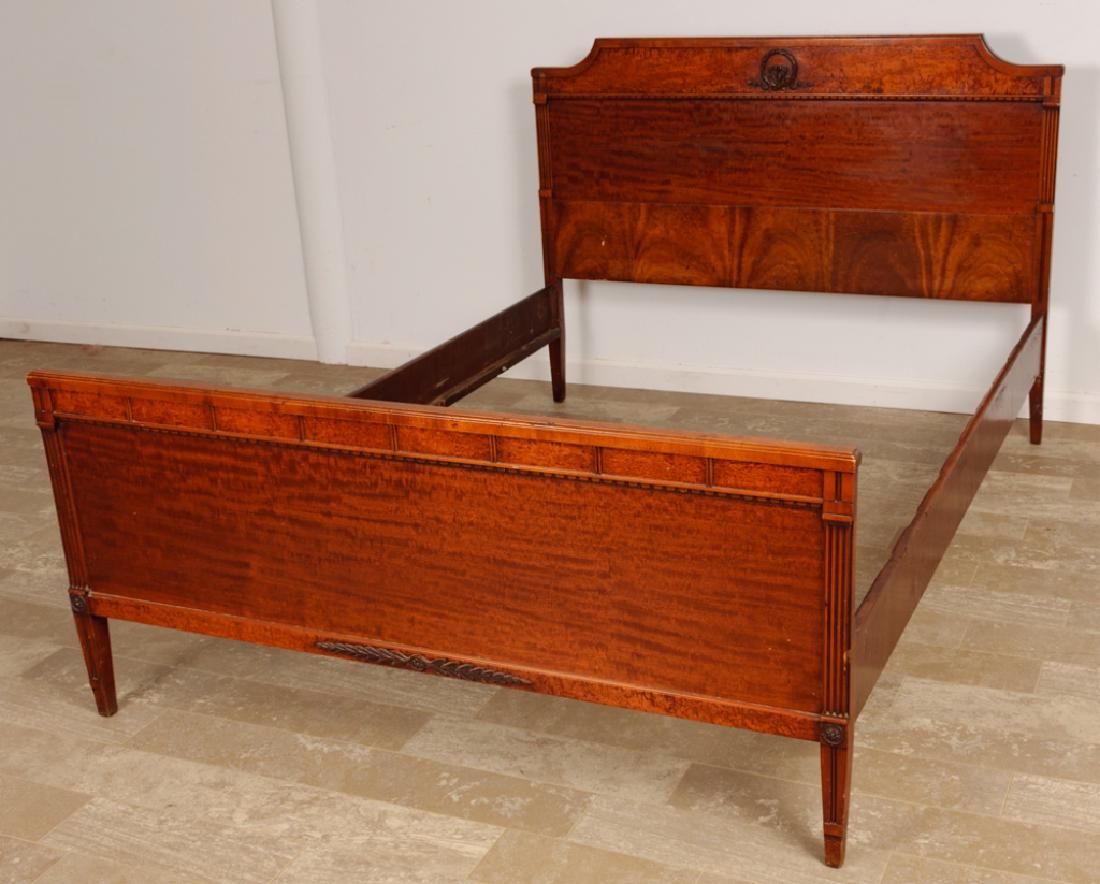 Burled Walnut Full Size Bed: Burled walnut full size bed with applied carvings to the headboard and footboard, and having fluted and rosette decorations; measures approximately 42" high, 54" wide (inside rail to inside rail), 56-