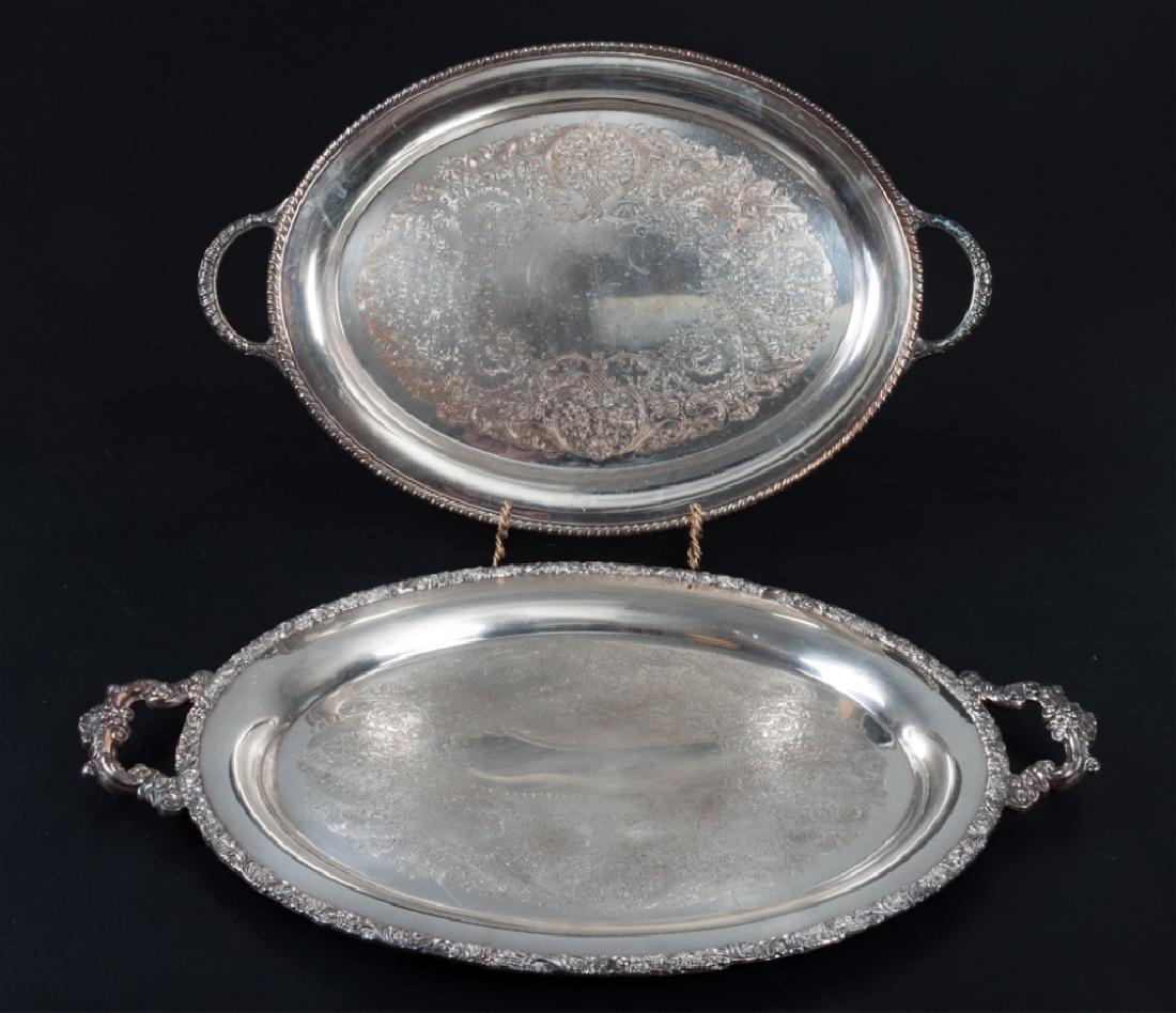 Wilcox & Wm. Rogers Silver Plated Serving Trays: Two silver plated trays to include: one Wm. Rogers #881 oval serving tray with double handle; measures approximately 15-1/4’ wide, and 24" long from handle to handle. The other a serving tray with d