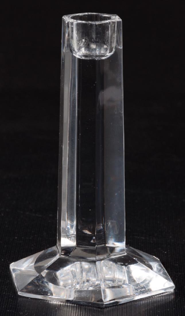 Tiffany Frank Lloyd Wright Crystal Candlestick: Frank Lloyd Wright by Tiffany clear crystal hexagonal candlestick with faceted sides, measuring 6" in height with base flat-to-flat width of 3-1/2" with full base point-to-point width of 4". Has origi