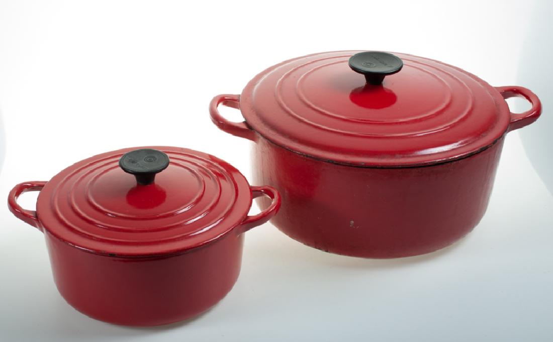 Le Creuset Dutch Oven & Mini Cocotte: Le Creuset red enameled Dutch oven with lid and mini cocotte with lid. Dutch oven marked â€œF" to the bottom and to the underside of matching lid; Dutch oven with lid measures 6-3/4" high, and 10-