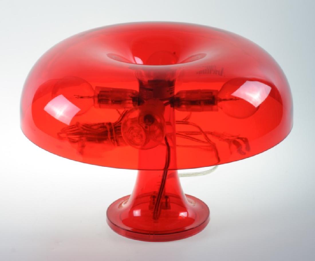 Artemide Nessino Mushroom Table Lamp: Translucent red Artemide Nessino table lamp with dimmer switch, in the shape of a mushroom. Made in Italy. Marked to the bottom of base. At time of cataloging lamp in good working condition. Measures