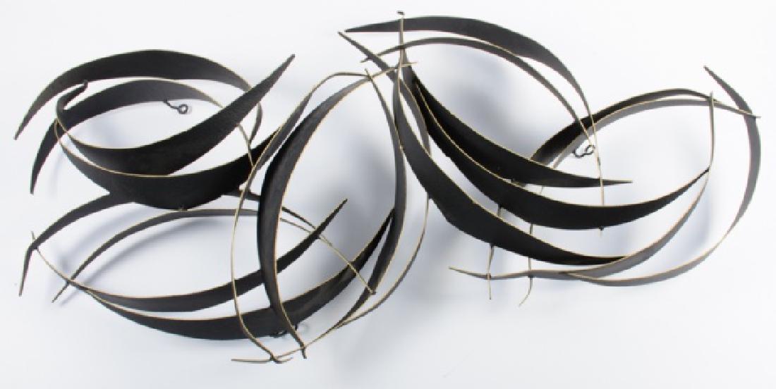 Curtis Jere Wall Sculpture: Curtis Jere (California, China 1920-2008) metal wall sculpture painted black with gilt accents, signed C Jere and dated 1993. Curtis Jere is a compound nom-de-plume of artists Curtis Freiler and Jerry