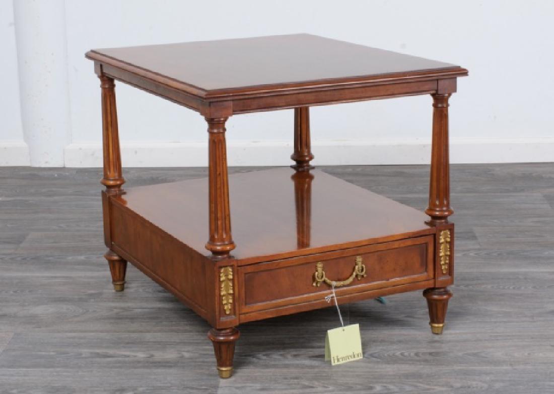 Henredon Side Table: Henredon side table, circa 1970's, having a molded edge top, single lower drawer, gilt metal mountings and fluted legs. With attached Henredon tag. In overall good condition consistent with age and us