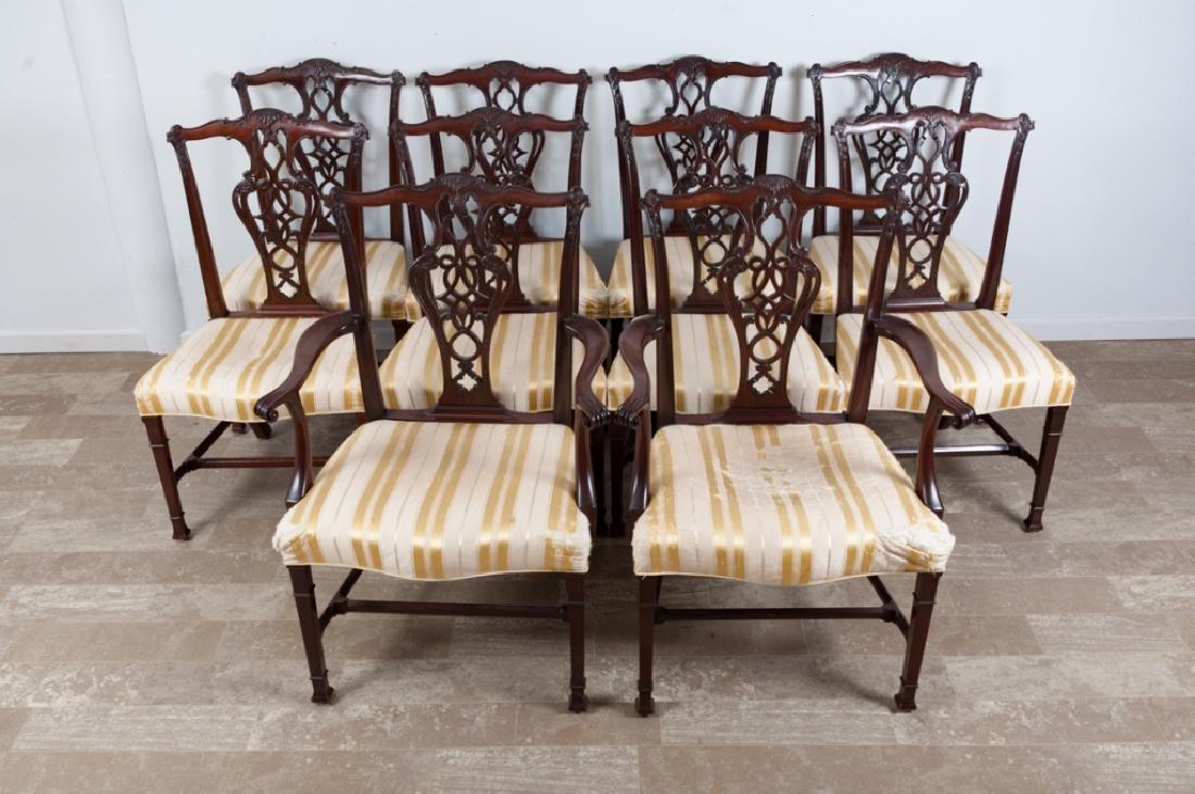 Chippendale Style Mahogany Dining Chairs: Ten (10) Chippendale style dining chairs of the L 19th/E 20th Century, to include two arm chairs and eight side chairs. All chairs with carved crest, pierced and carved splat, shaped seat with striped