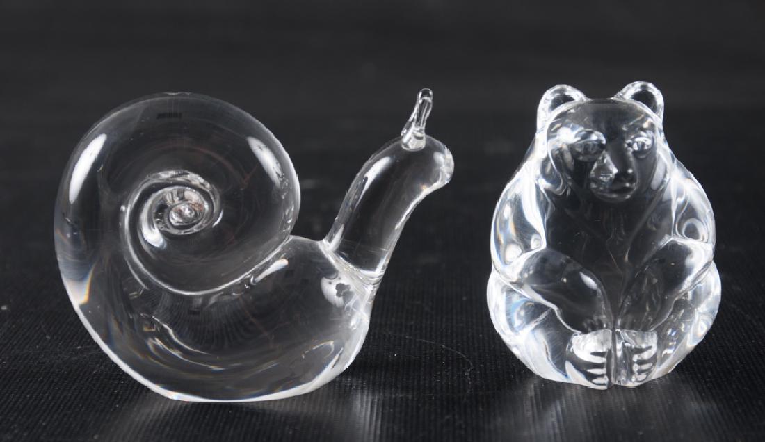 Steuben Animal Form Hand Coolers: Two Steuben hand coolers in the form of a bear and a snail. Both marked to the bottom. Largest measures approximately 2-1/2" high.