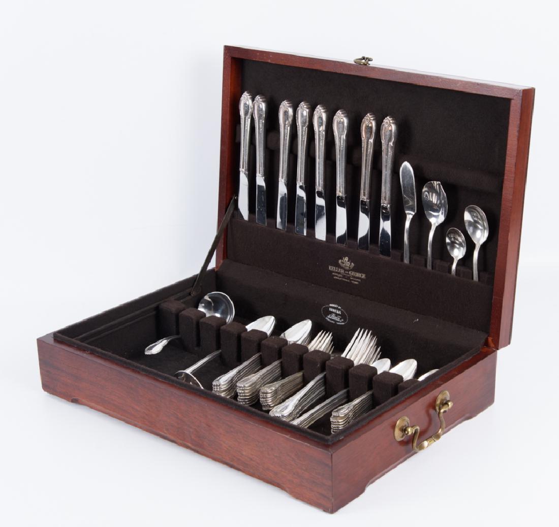 Rogers Bros Remembrance Silverplate Flatware: Seventy pieces in a tarnish proof box. Eight place settings with serving pieces.