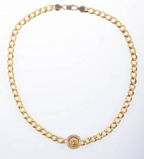 Versace 18K Gold and Diamond Medusa Necklace: Gianni Versace gold and diamond limited edition Medusa necklace. Stamped 18k 750. to back. Solid curb chain 6.7mm wide and 16" in length. Lobster clasp. Approximate weight 1.92 ozt.All sales are subje