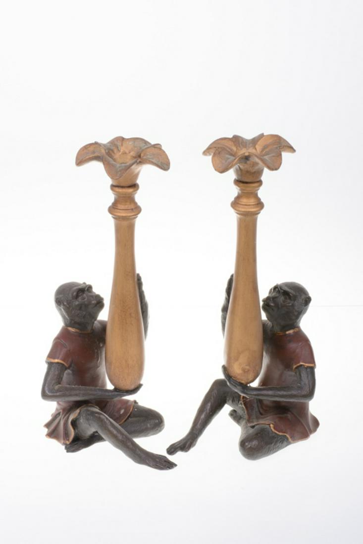 Monkey Figure Candle Holders: Pair of monkey figure candle holders. Measure approximately 10-5/8" high each. All sales are subject to Bremo Auctions Terms & Conditions. Please review before bidding.