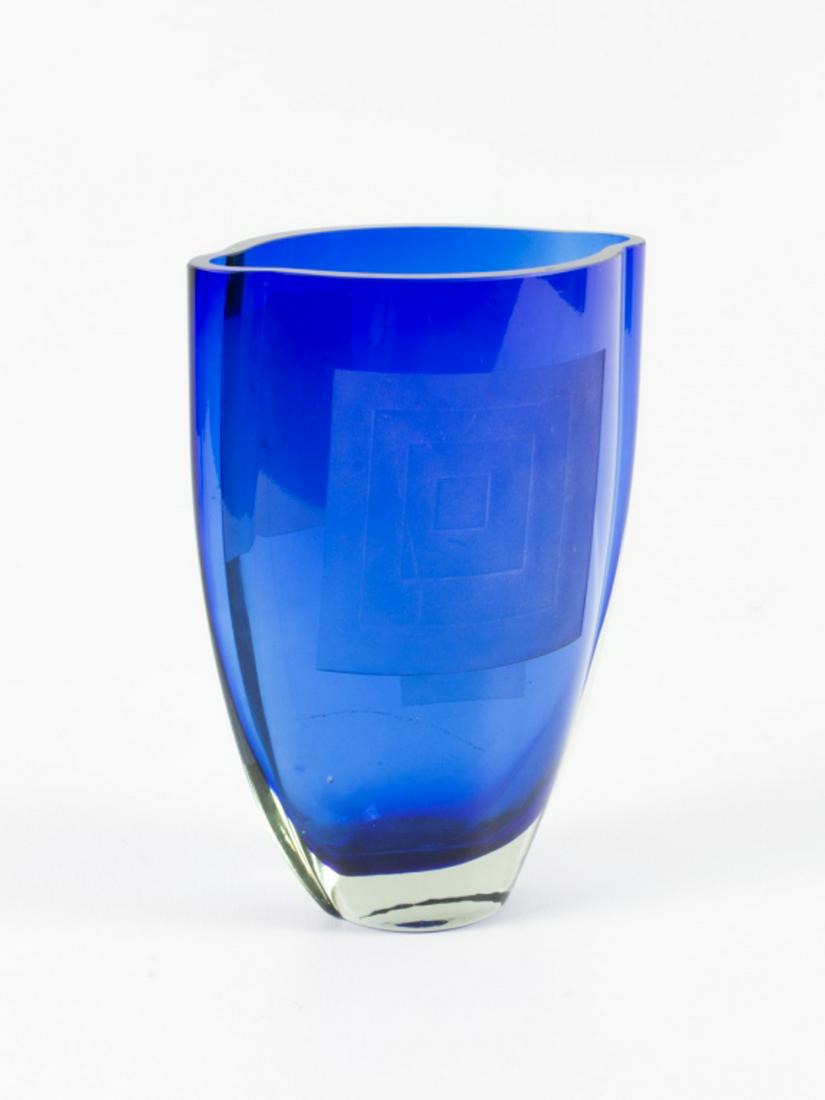 Blue Glass Pocket Vase: Blue thick wall pocket vase with frosted square decorations. Measures approximately 10-18/" high, 7-1/2" wide, and 4-3/4" deep. All sales are subject to Bremo Auctions Terms & Conditions. Please revie