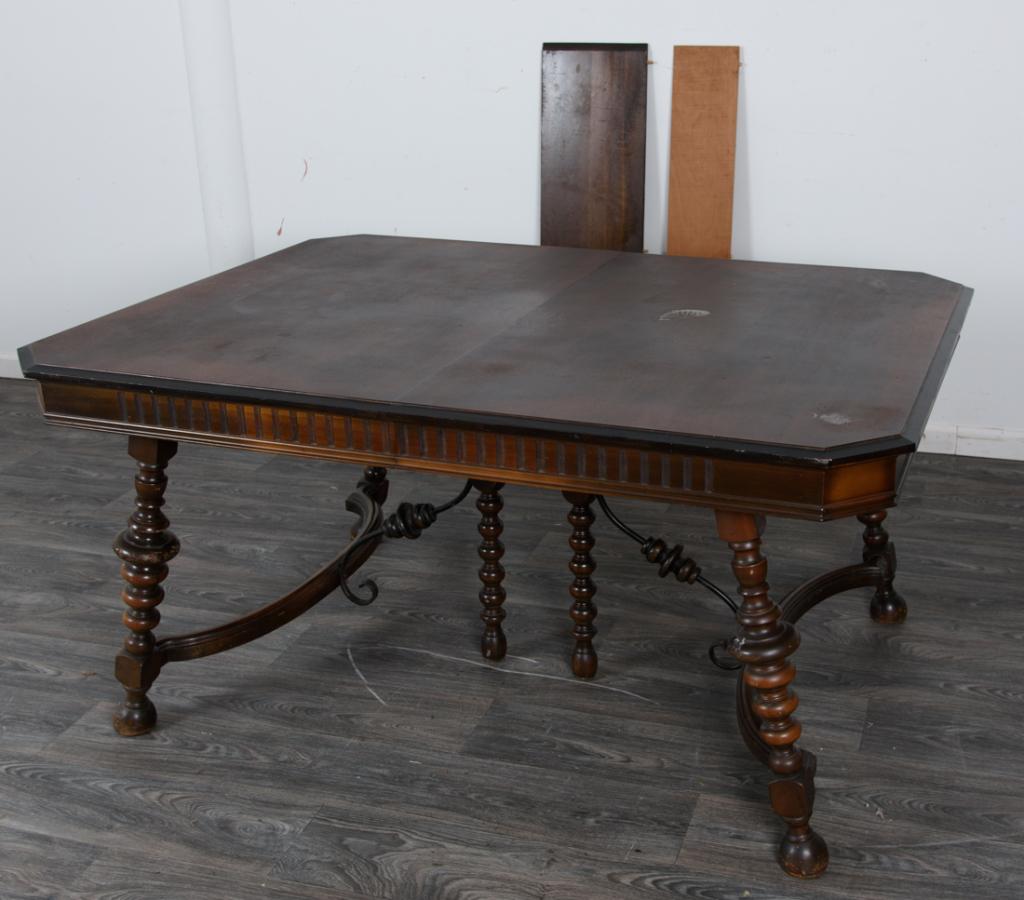 1930's Dining Table: Dining table by the Empire Furniture Co. of Huntington, West Virginia having a walnut finish on turned legs and ball feet. With wrought iron and wood turned center support. In overall good condition c