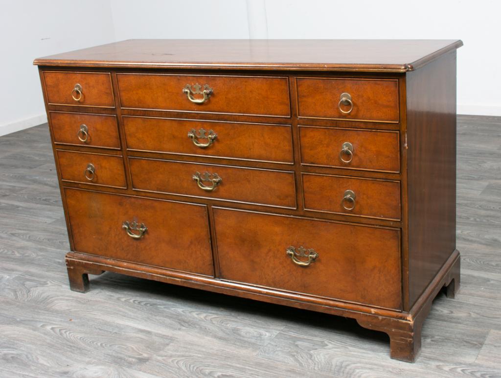 Kittinger Mahogany Georgian Style Double Dresser: Kittinger Buffalo Georgian style double dresser having a molded ovolo corner top over three sets of three drawers over two drawers, all mahogany with burl veneer drawer fronts and cockbead moldings, o