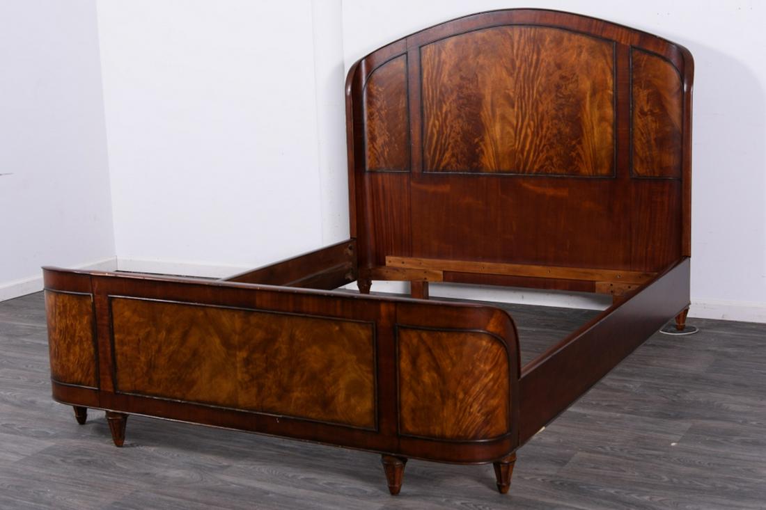 Mahogany Wrapped Queen Bed: Mahogany with paneled headboard and footboard. In overall good condition consistent with age and use. Measures approximately 54-1/4" high, 63-1//2" wide and 85" long.All sales are subject to Bremo Auc