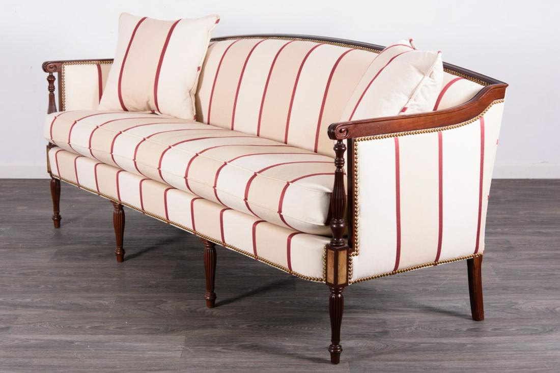 Hickory Chair Federal Style Sofa: With mahogany frame and brass studded, having red and ivory upholstery. In overall good condition consistent with age and use. Measures approximately 30-1/2" high, 77-1/4" wide, 27-1/2" deep. All sale