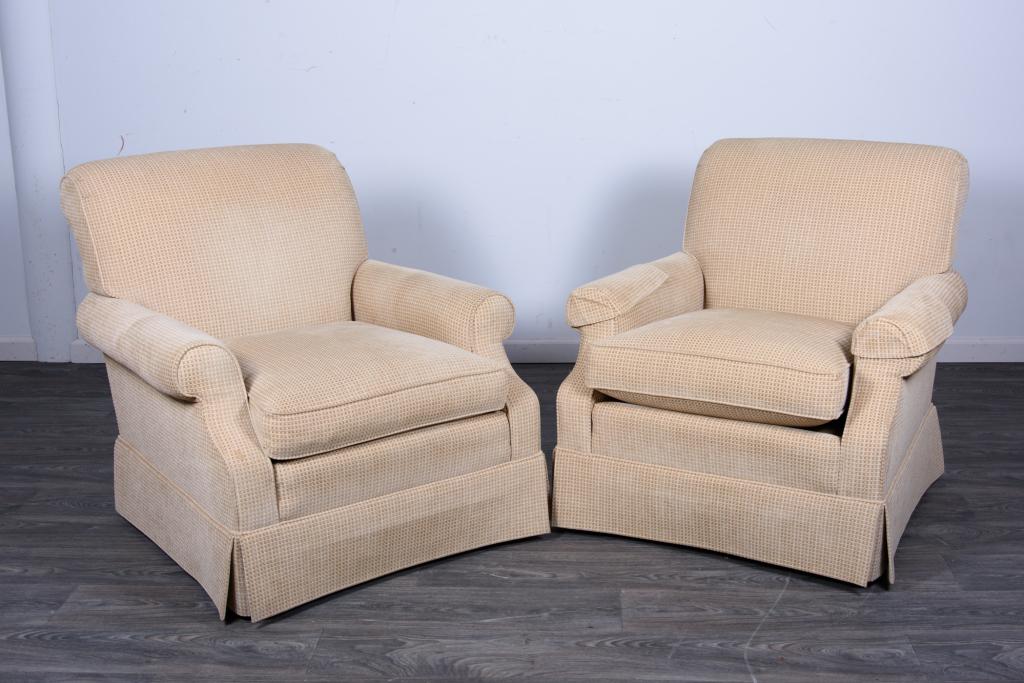 Pair of Stickley Easy Chairs: Both chairs upholstered with a textured basket weave pattern. In overall good condition consistent with age and use.All sales are subject to Bremo Auctions Terms & Conditions. Please review before bid