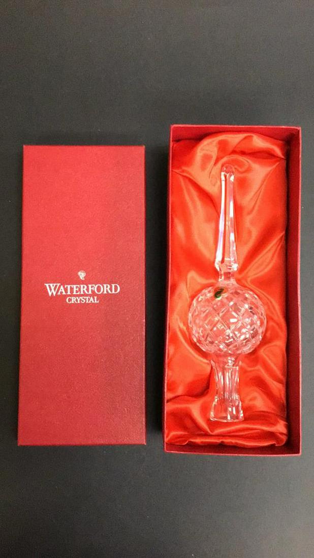 Waterford Crystal Christmas Tree Topper: In original box with paper label. Measures approximately 10-1/2" high. All sales are subject to Bremo Auctions Terms & Conditions. Please review before bidding.