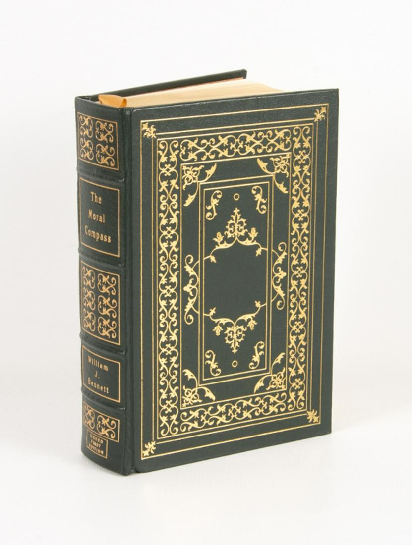 William J. Bennett, The Moral Compass: The Moral Compass by William J. Bennett, signed Number 2,381 of 45,00. Collector's Edition, leather bound, published by The Easton Press, Norwalk, Connecticut. In good condition.