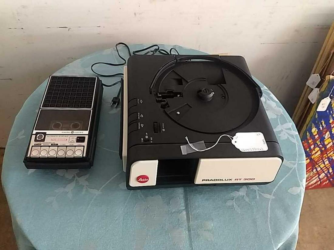 Pradolux Projector and Tape Recorder: Pradolux rt300 and tape recorder.All sales are subject to Bremo Auctions Terms & Conditions. Please review before bidding.