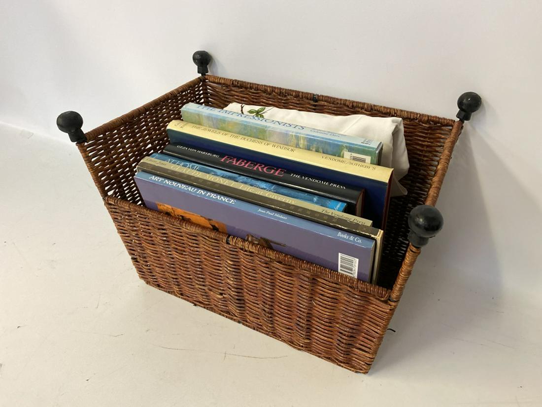 Art Books and Wicker Book Rack: Volumes include: At Home, The American Family 1750-1870; Claude Monet, Life at Giverny; An Asian art book; The Impressionist; The Jewels of the Duchess of Windsor; Art Nouveau in France and Faberge al