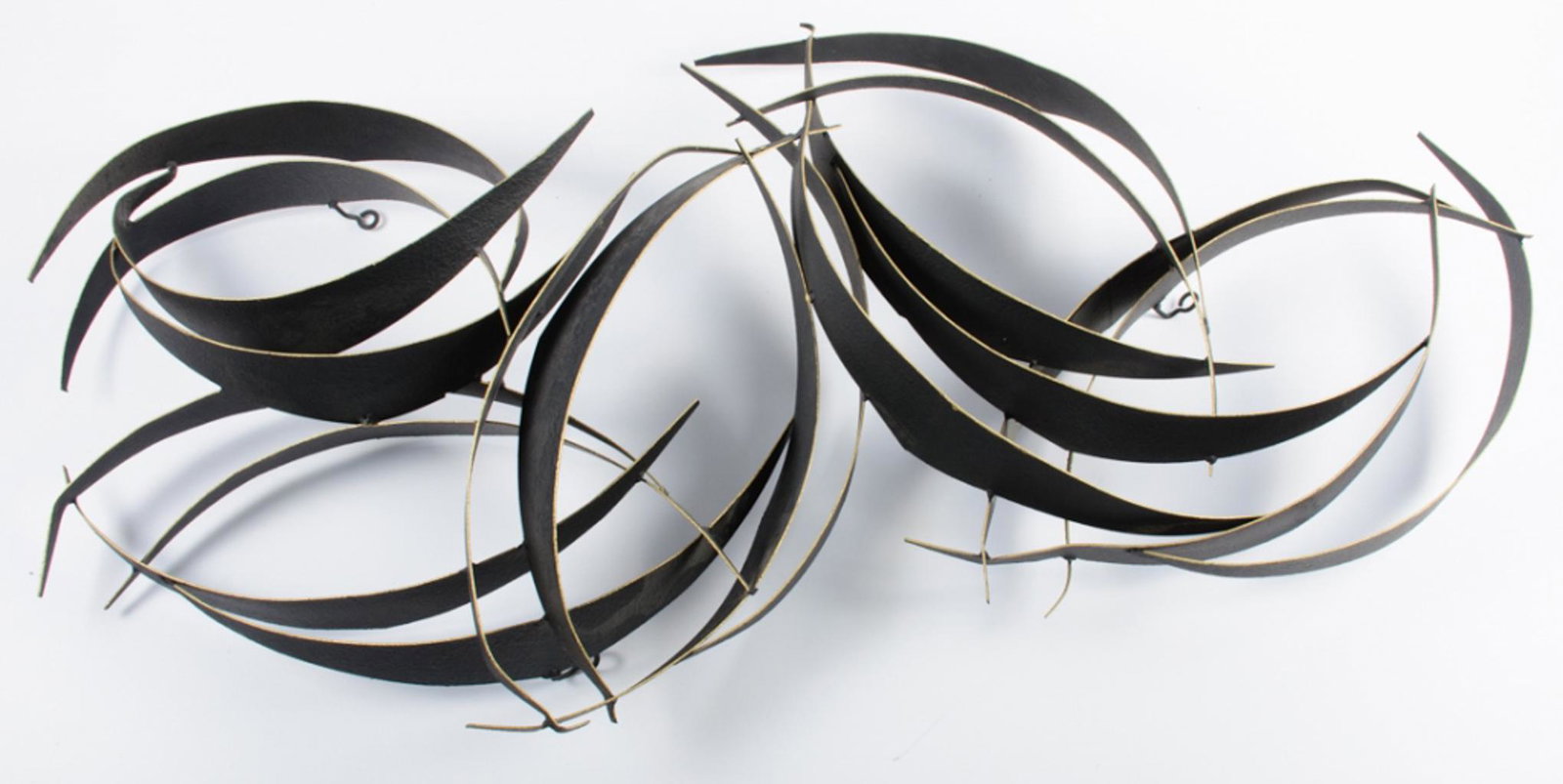 Curtis JerÃ© Wall Sculpture: Curtis JerÃ© (California, China 1920-2008) metal wall sculpture painted black with gilt accents, signed C JerÃ© and dated 1993. Curtis JerÃ© is a compound nom-de-plume of artists Curtis Freiler 