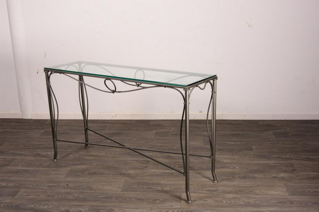 Glass Top Console Table: Metal frame. Measures approximately 32-3/4" high, 54" wide and 16" deep. All sales are subject to Bremo Auctions Terms & Conditions. Please review before bidding.