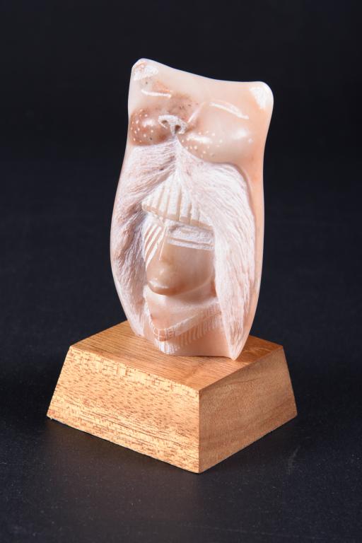 Native American Sculpture: Stone and metal sculpture of Indian on wood base. Signed to lower back G. Paul Toya '93. Likely G. Paul Toya, from Jemez Pueblo, New Mexico. Measures approximately 5-1/2" tall.