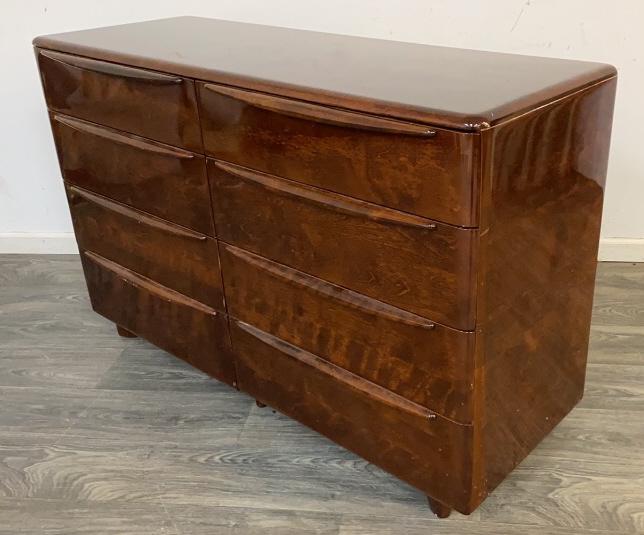 Haywood Wakefield Mid Century Chest of Drawers: Eight drawer chest by Haywood Wakefield. Makers stamp to the top left drawer. In overall good condition consistent with age and use. Measures approximately 34" high, 53-1/2" wide and 18-5/8" deep.
