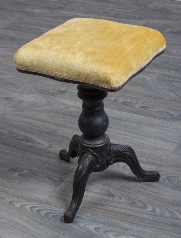 Antique Cast Iron Piano Stool: 19th Century cast iron piano stool having a gold velvet upholstered top. In overall good condition consistent with age and use. Measures approximately 19' high.