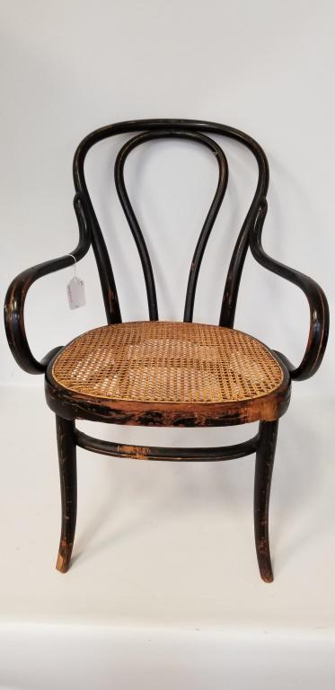 Louisiana Bentwood Arm Chair: Painted black and with caned insert to the seat. From the private collection of Roulhac Toledano, noted author, historian, artist, and tireless promoter of Charlottesville.
