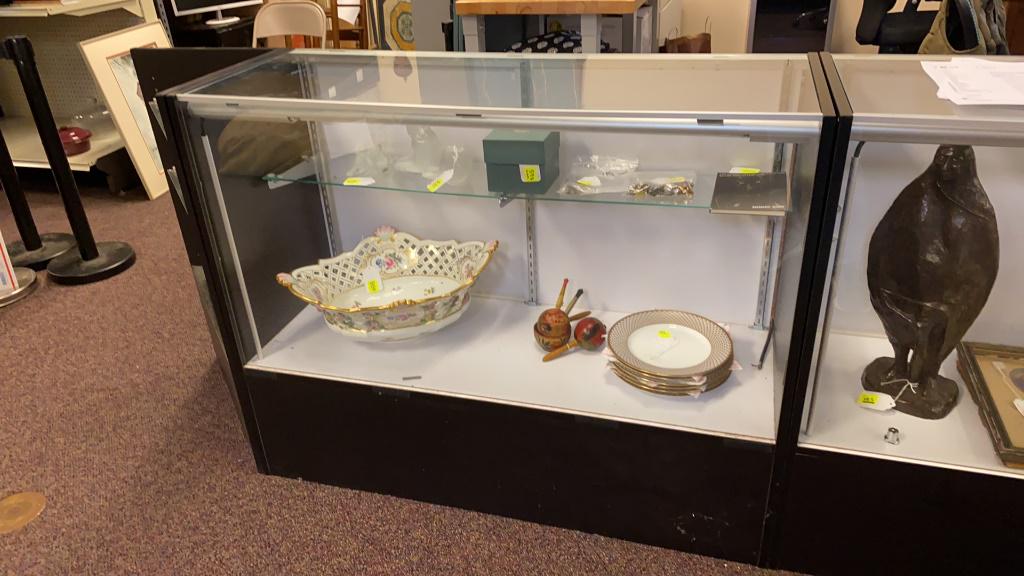Glass Display Case: Two shelf display case with internal lighting. Photograph is of similar case. In overall good condition. Measures approximately 38" high, 48" wide and 17-1/2" deep.